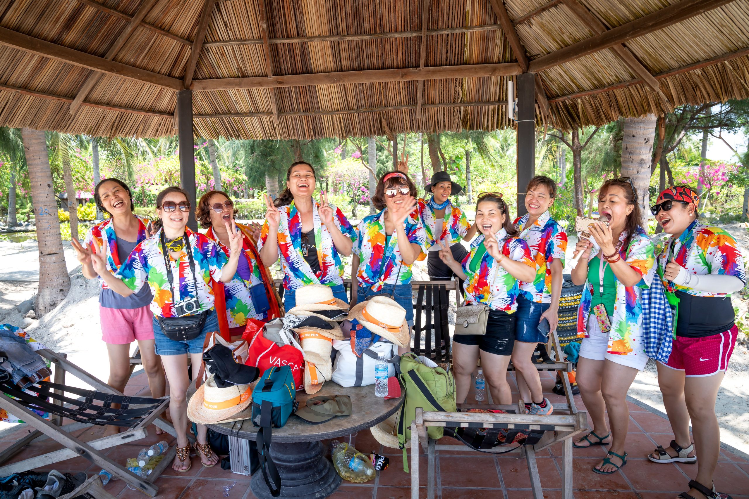 A corporate team participating in an outdoor activity, representing custom company retreat planning and incentive trips by Selah and Sparrow Travel.